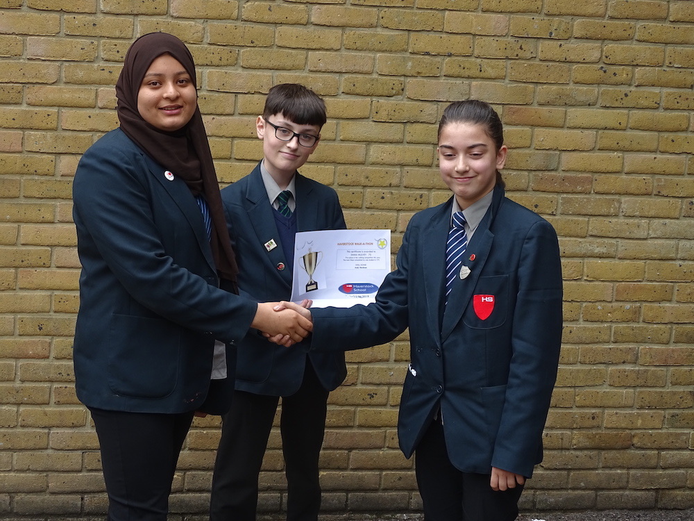 Haverstock school camden youth travel ambassadors congratulate walk a thon winner may 2019