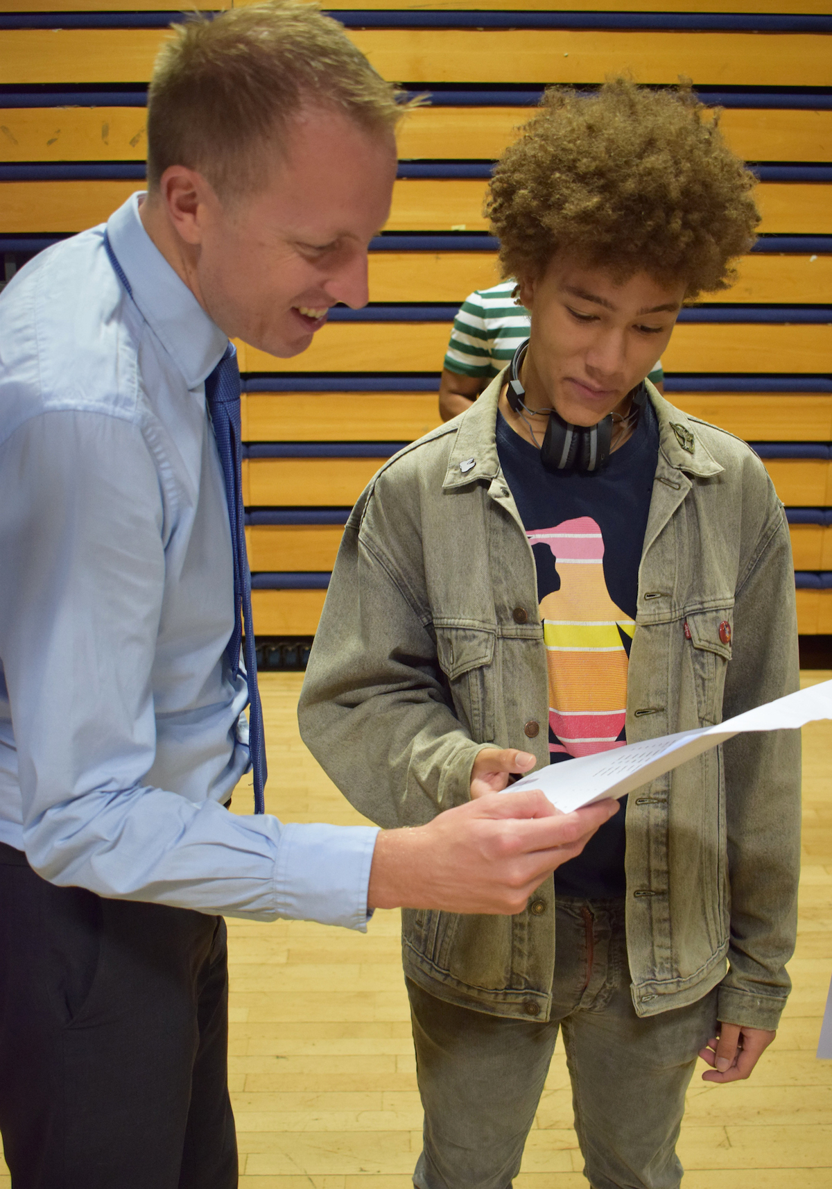 Haverstock headteacher James Hadley celebrates the school's BEST EVER GCSE results with a successful student, August 2019