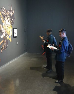 Students from haverstock school in camden visit the manga exhibition as part of their bronze arts award qualification