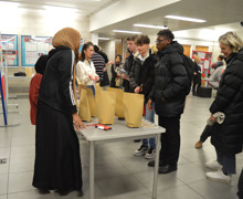 Haverstock sixth form camden london open evening 2019 students visit the display stalls to discuss sixth form life in camden and a level subjects